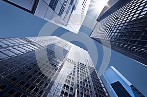 Looking up at business buildings