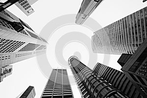 Looking up at business buildings in downtown with B&W color