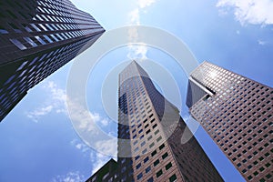 Looking up at business buildings at singapore