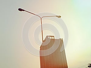 Looking up at business buildings with filter color