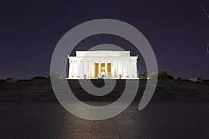 Looking up the Ceremonial approach towards the illuminated Lincoln Memorial on the National Mall in Washington