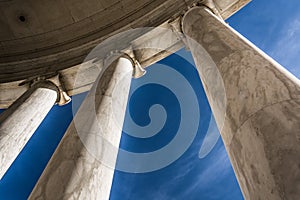 Looking up at columns at the Thomas Jefferson Memorial, Washington, DC.