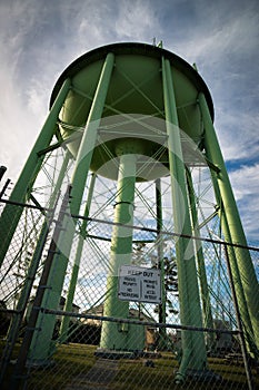 Looking Up at Giant Green Water Tower