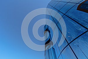 Looking up at glass business building