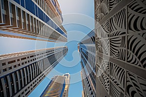 Looking up at a group of modern office buildings