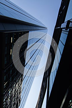 Looking up Near Old Broad St, City of London, UK