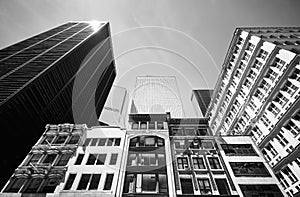 Looking up at old and modern buildings in New York, USA