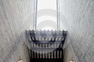 Looking up at roof in alley