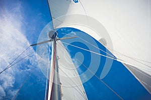 Looking up at a sailboat mast