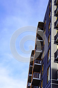 Looking up to the new modern apartments building in Lasnamae district. Tallinn, Estonia, Europe. March 2024