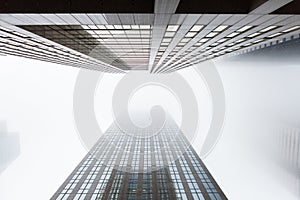 Looking up two highrise skyscapers in Toronto, Canada