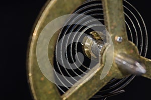 Looking Through a Vintage Metallic Balance Wheel to Its Hairspring