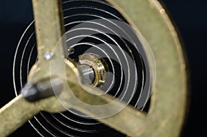 Looking Through a Vintage Metallic Balance Wheel to Its Hairspring