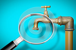 Looking for water - concept image with a detail of a old water brass faucet