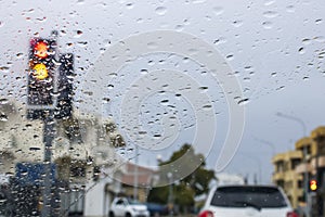 Looking through wet car windshield