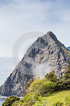 Lookout Rock rising above the beach