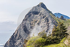 Lookout Rock rising above the beach