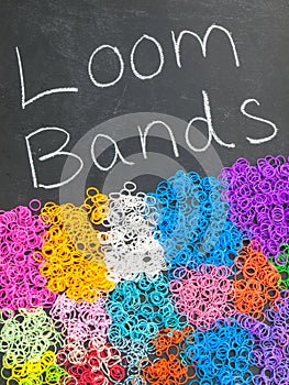 Loom bands on a blackboard