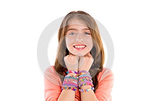 Loom rubber bands bracelets blond kid girl smile