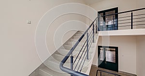 loop rotation and panoramic view in empty modern hall with emergency and evacuation exit stair and panoramic windows.