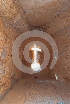 A loophole with a shape of a cross at medieval moorish fortress