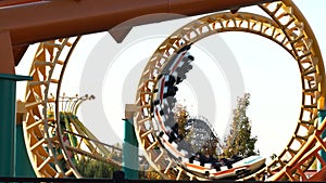 Looping roller coaster performing two inversions with no people in it