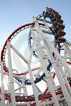 The loops of a scaring roller coaster. photo