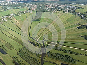 Loosdrecht recreational water river and meadow rural grass land green marsh in beautifull pattern small rivers and
