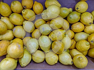 Loose lemons for sale in a supermaket