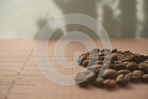 Loose roasted coffee beans on an ECG tracing