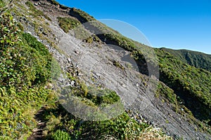 The loose rock face and landslide area of Boomerang Slip track in Egmont national park, New Zealand.