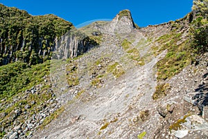 The loose rock face and landslide area of Boomerang Slip track in Egmont national park, New Zealand.