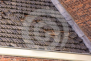 loose roof tiles after storm