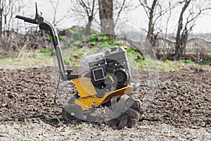 Loosens the soil cultivator side view