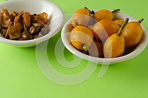 Loquat fruits. Exotic healthy food concept