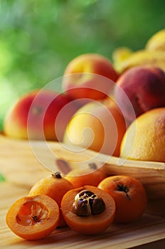 Loquat medlar with nany fruits photo
