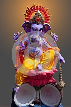 Lord Ganesh sitting on lotus