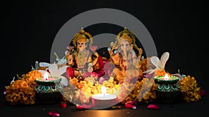 The Lord Ganesha and Goddess Laxmi - Hindu religion and Indian celebration of Diwali festival