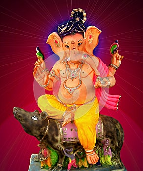 Lord Ganesha sitting on mouse