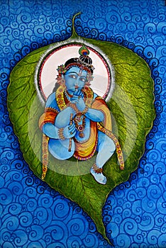Lord Krishna lying on a banyan leaf