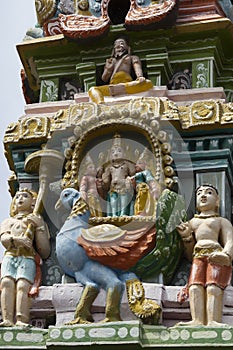 Lord Murugan and wives on Gopuram.