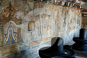 Lord shiva linga statue with Fresco Mural Thanjavur paintings in historical Brihadeeswarar temple in Thanjavur, Tamilnadu.