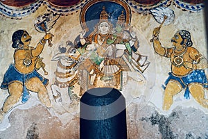 Lord shiva linga statue with Fresco Mural Thanjavur paintings in historical Brihadeeswarar temple in Thanjavur, Tamilnadu.