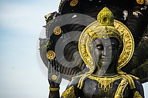 Lord Vishnu statue in a sitting position , Thailand