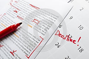 Lorem ipsum.Closeup of script, red marker and calendar with word Deadline on it