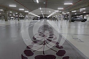 Lorient, France - February 01, 2017:Empty underground car park illuminated at night