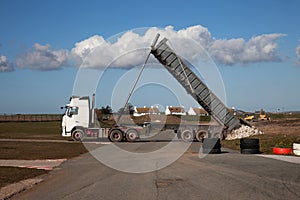 Lorry dumping hard core