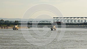 Lorry passing over bridge at Danube river