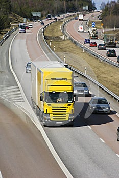 Lorry surrounded by traffic