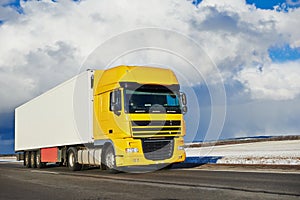 Lorry with trailer driving on highway